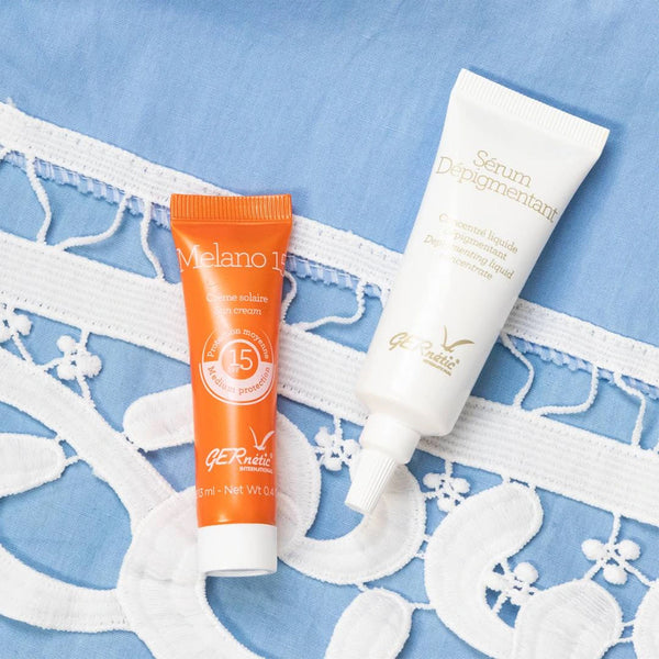 Šviesinimasis serumas + apsauga nuo saulės Melano 15